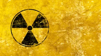 Nuclear symbol on gold background. 